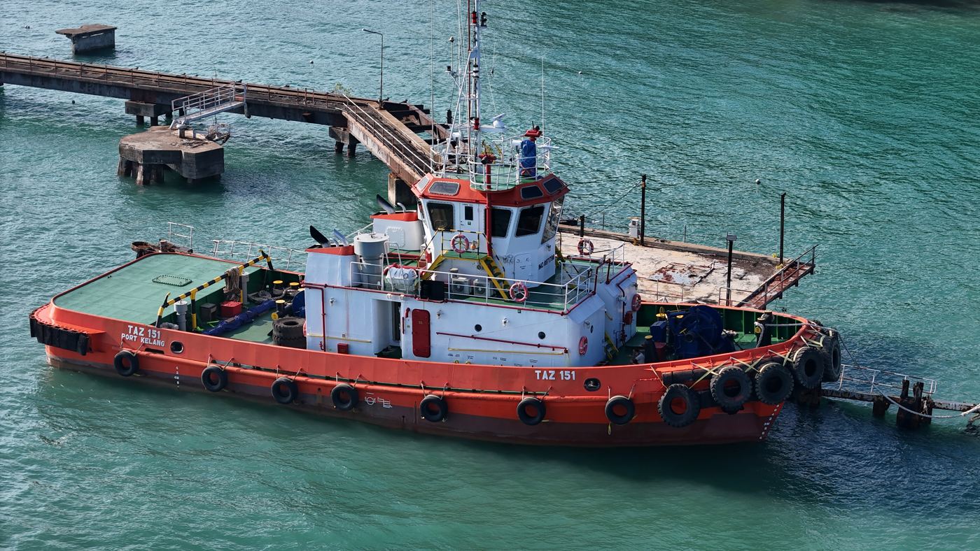Tug berthed at a jetty